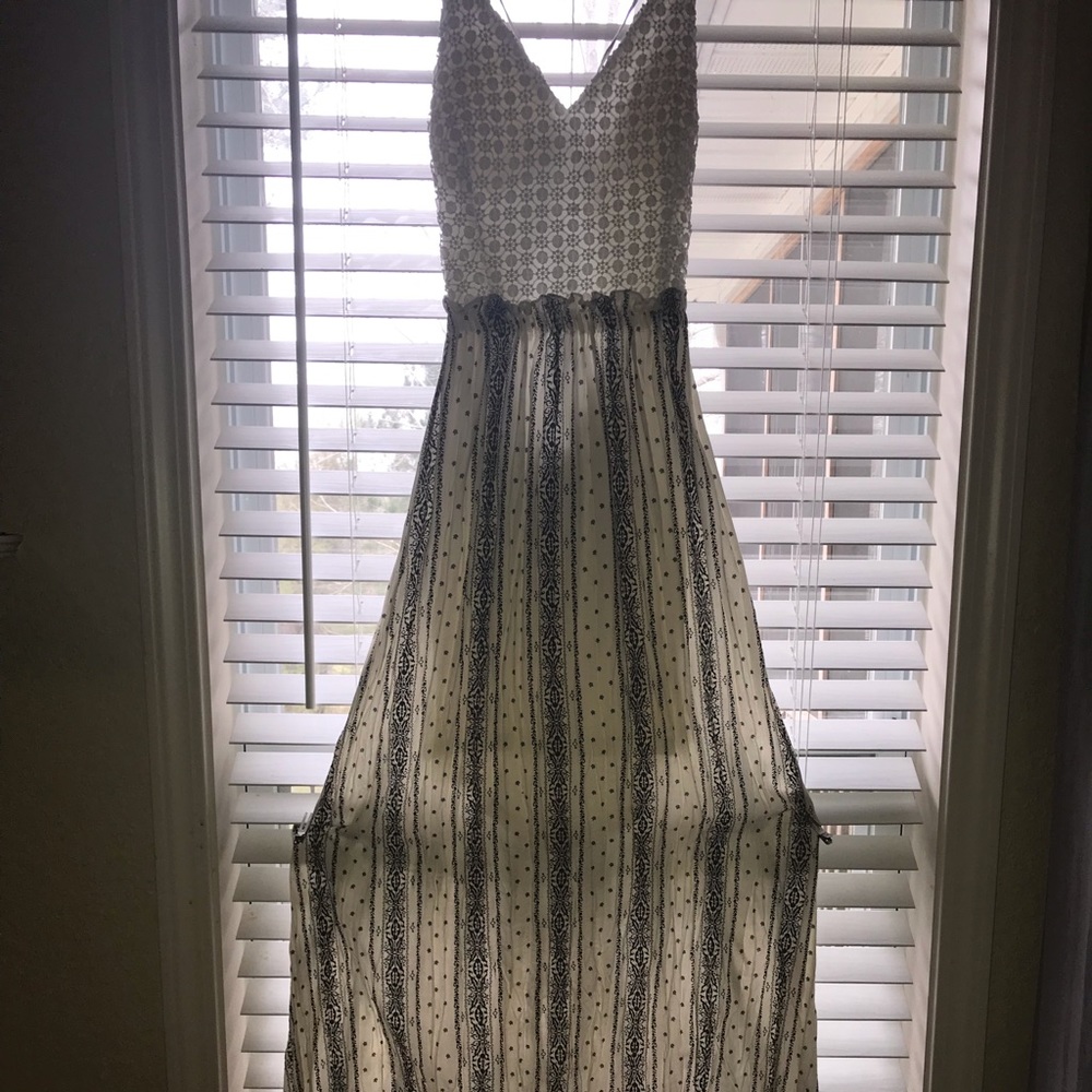 Woman’s sleeveless lace up strappy maxi dress